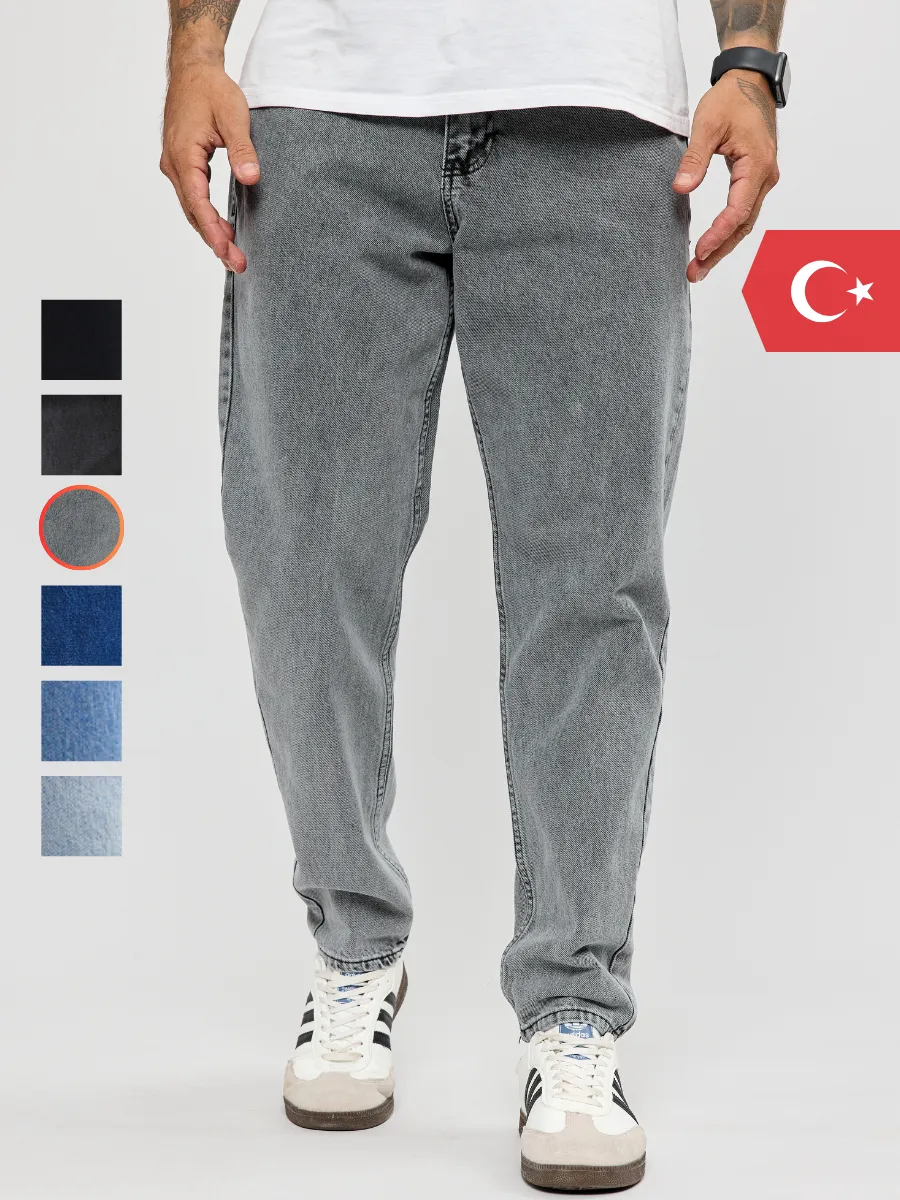 Джинсы бананы зауженные к низу мом