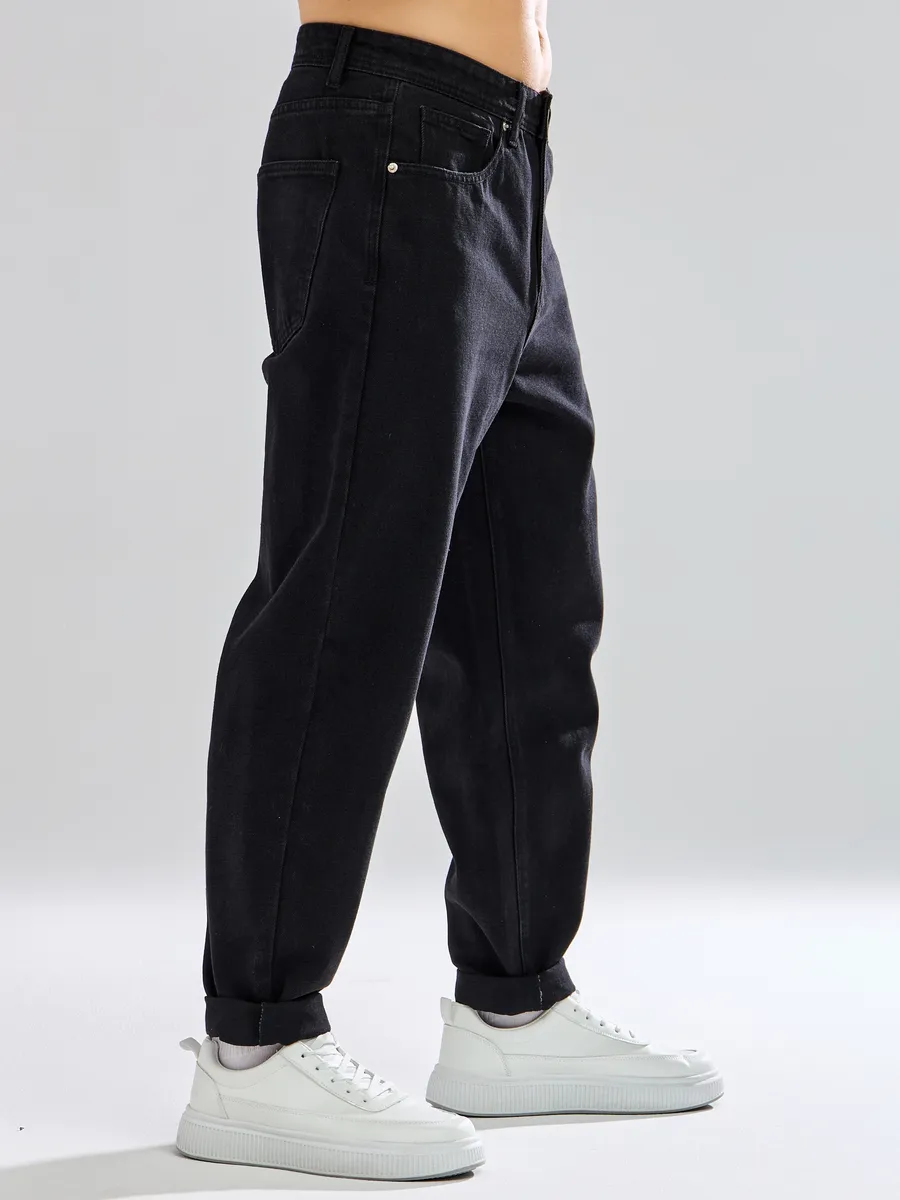 Джинсы бананы зауженные к низу мом