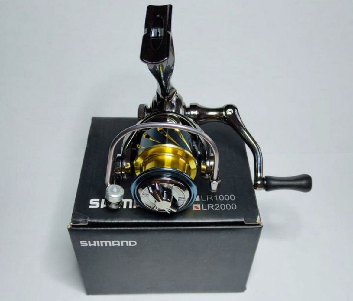 Рыболовная катушка Shimano 2000